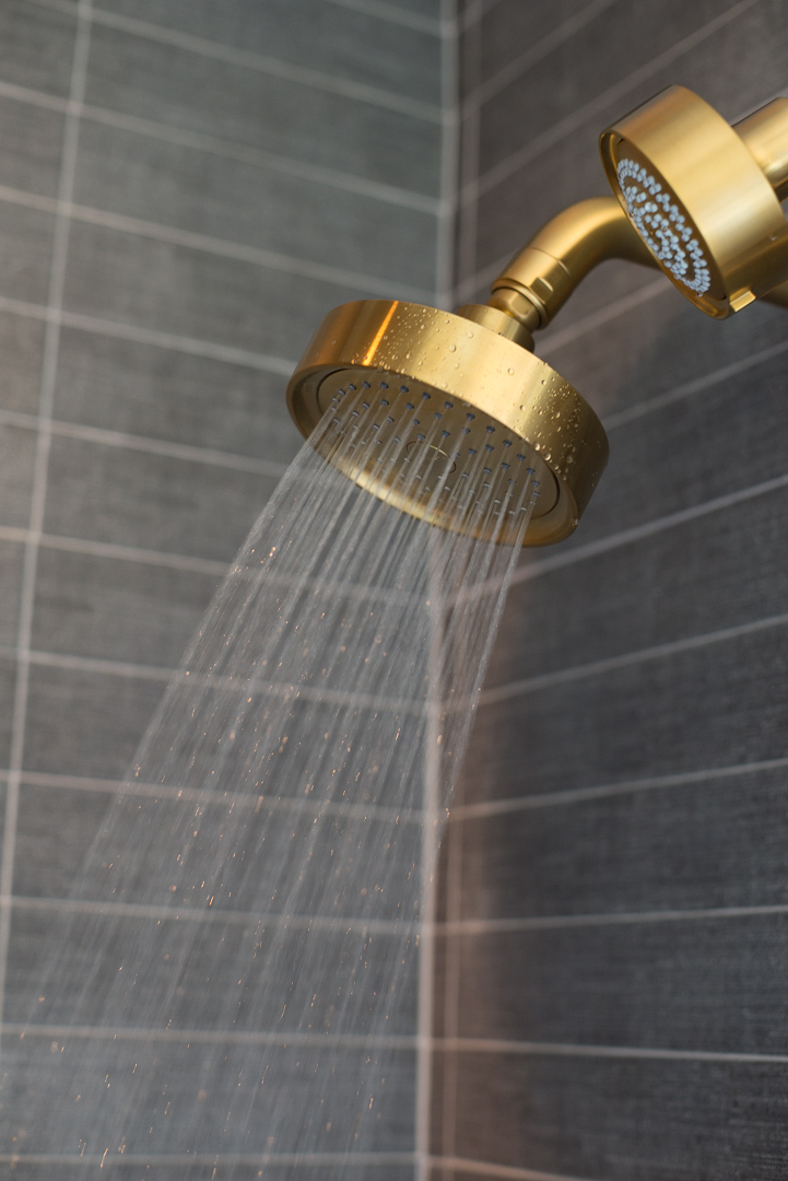 Industrial Chic Townhouses Wayne - contact - custom shower enclosure with brass shower head